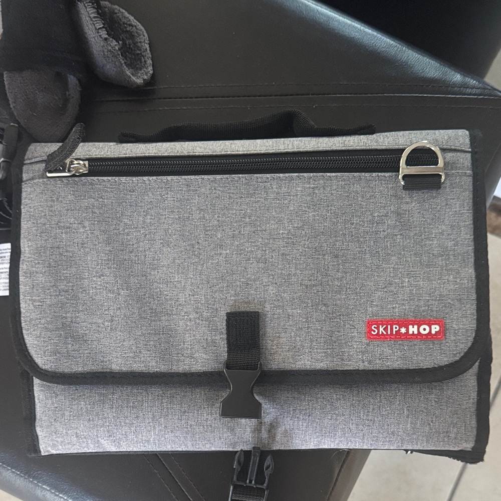 Skip Hop Black and Gray Portable baby changing station